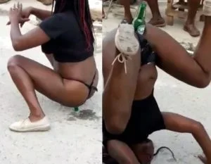 Mulata bêbada dançando com garrafa na boceta