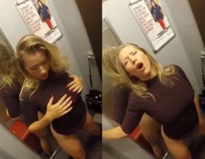 Se masturbando no provador de roupas